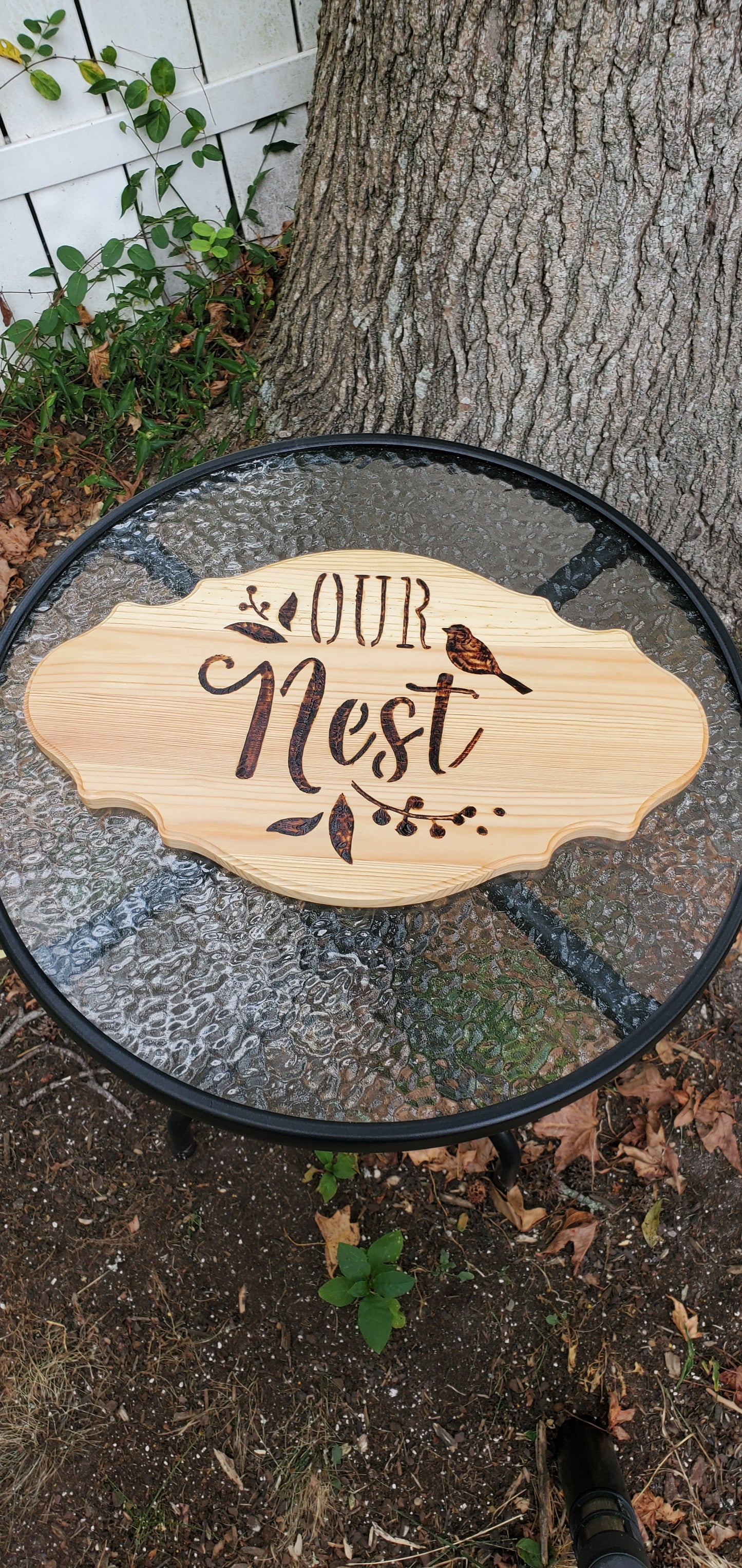 "OUR NEST" hanging sign