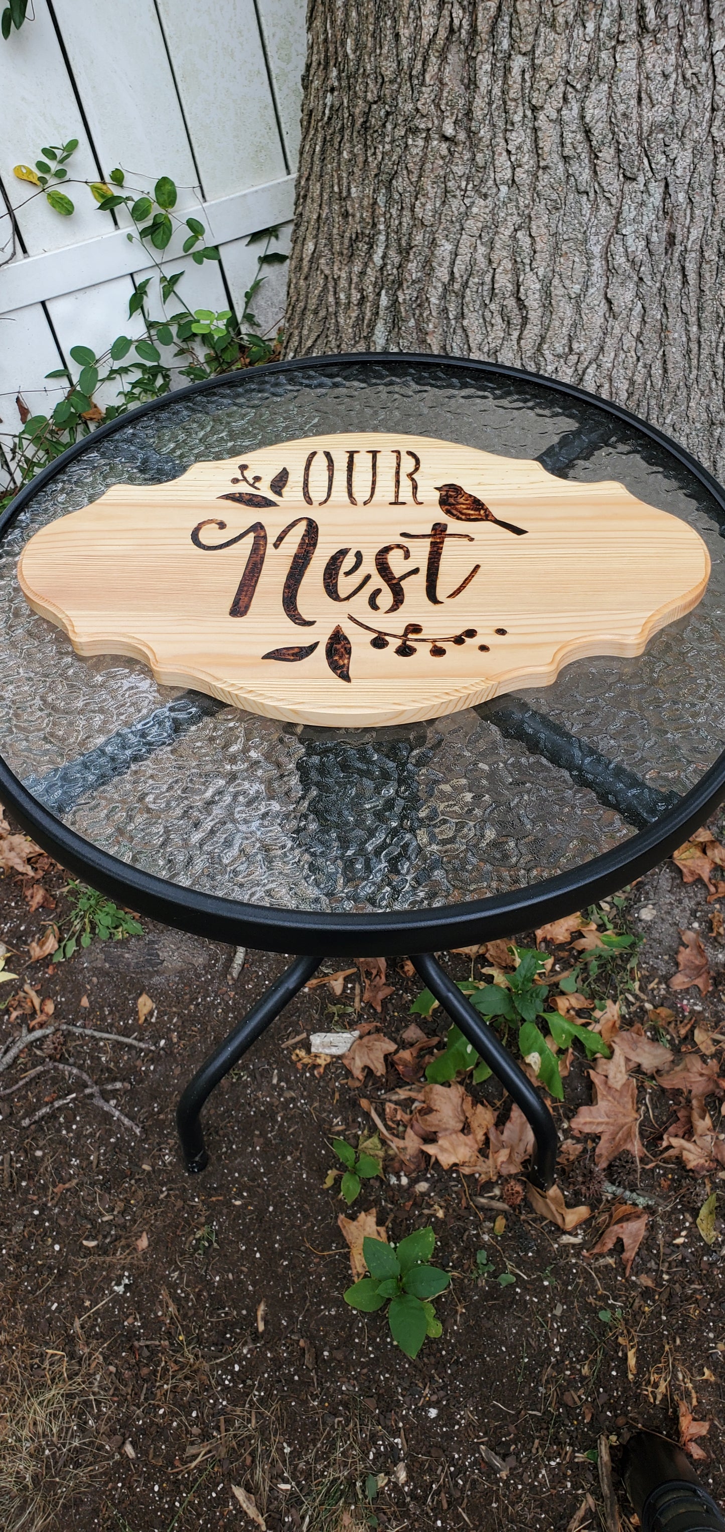 "OUR NEST" hanging sign